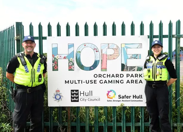 Sergeant Andy Waller and PCSO Sammy Temple with the HOPE logo on Orchard Park