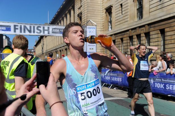 Former Hull boxer Luke Campbell - now the Mayor of Hull and East Yorkshire - taking a well-earned drink after finishing a previous Hull 10K