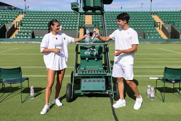 Emma Raducanu and Carlos Alcaraz attend evian's Pre-Wimbledon event at their Mountain Of Youth VIP Suite at Wimbledon on June 27, 2025 in London, England.