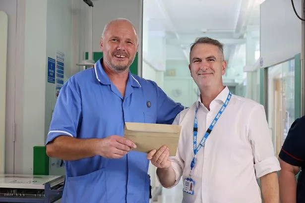 Paul Johnson was surprised with the NHS Gold Award at Ward 4 of the Hull Royal Infirmary.