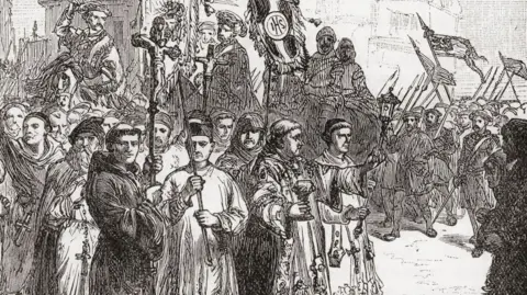 Getty Images A black and white line drawing showing a crowd of monks and armed men, some holding crucifixes, others banners, wearing medieval dress and gathered in front of stone buildings.