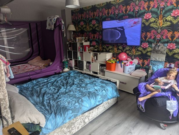 Betsy said: "This is our bedroom, that was the living room. The hoist doesn't work because of space and due to this lack of space it makes it so we can't fully meet Ivy's needs. Ivy needs ground level access due to requiring round-the-clock care day and night."