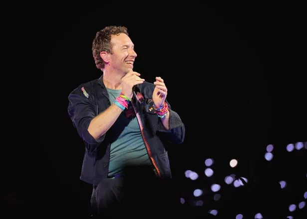 Chris Martin of Coldplay performs at Nissan Stadium on July 22, 2025 in Nashville, Tennessee. 