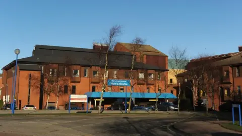 PA Media The image shows the main entrance of Scarborough Hospital.