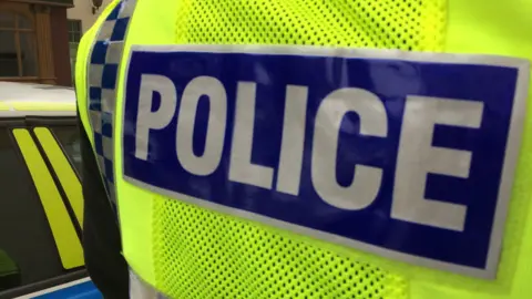 BBC A stock image of a fluorescent police jacket