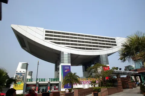 Getty Images The Peak Tower, a curved building on legs