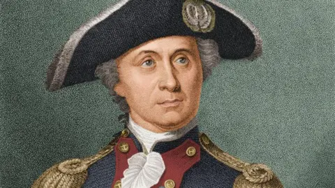 Getty Images A portrait drawing of an American naval captain from the 18th century. He is wearing a black hat, has grey curly hair down each side of his head and is wearing a blue uniform with golden lapels. 