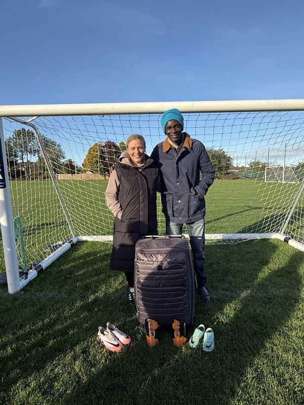 Francis, right, of Adeline School, Freetown, visited some of the Chanterlands Girls Football Club training sessions to receive second-hand kits and other equipment 