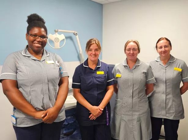Senior sister, Catherine Hellewell (dark uniform) and members of the phlebotomy team