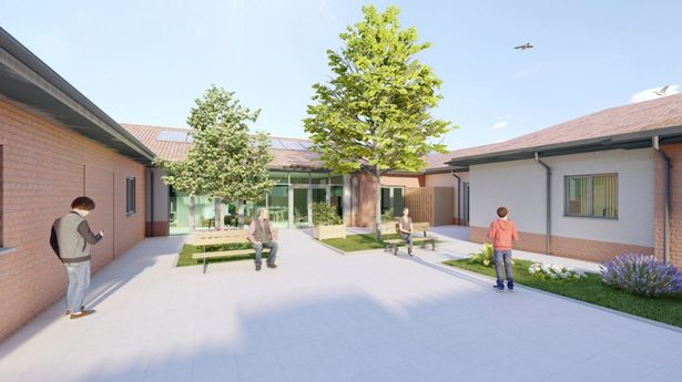 A courtyard would be formed in the centre of the site