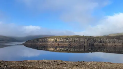 Yorkshire Water Winscar Reservoir, is a compensation reservoir on the headwaters of the River Don in South Yorkshire, England. The image shows the reservoir appears to be fuller than during the summer months