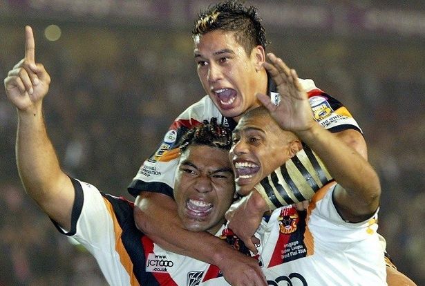 Bradford Bulls's Lesley Vainikolo, Shontyne Hape and Leon Pryce celebrate defeating Leeds Rhinos