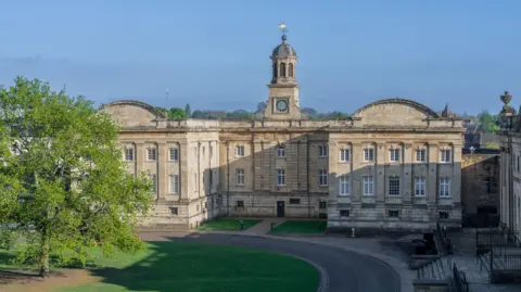 Getty Images York Castle Museum, a grand, historic building made of pale stone, is pictured on a sunny day.