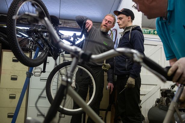 Volunteers for the Bike Project learn skills and gain work experience