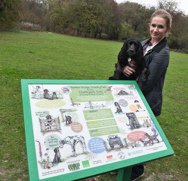 Artist Eleanor Tomlinson with the panel she designed for Humber Bridge Country Park