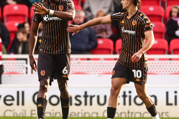 Mo Belloumi celebrates the equalising goal with Semi Ajayi at Stoke City