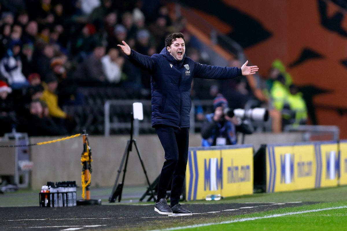 Ryan Mason shows his frustration during the defeat at Hull City