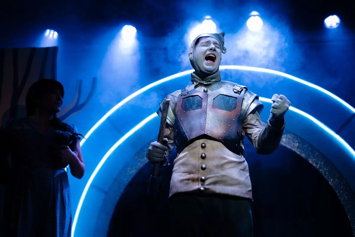 Tin Man (Jack Chamberlain) belting out a very funny but no less emotional version of Bright Eyes