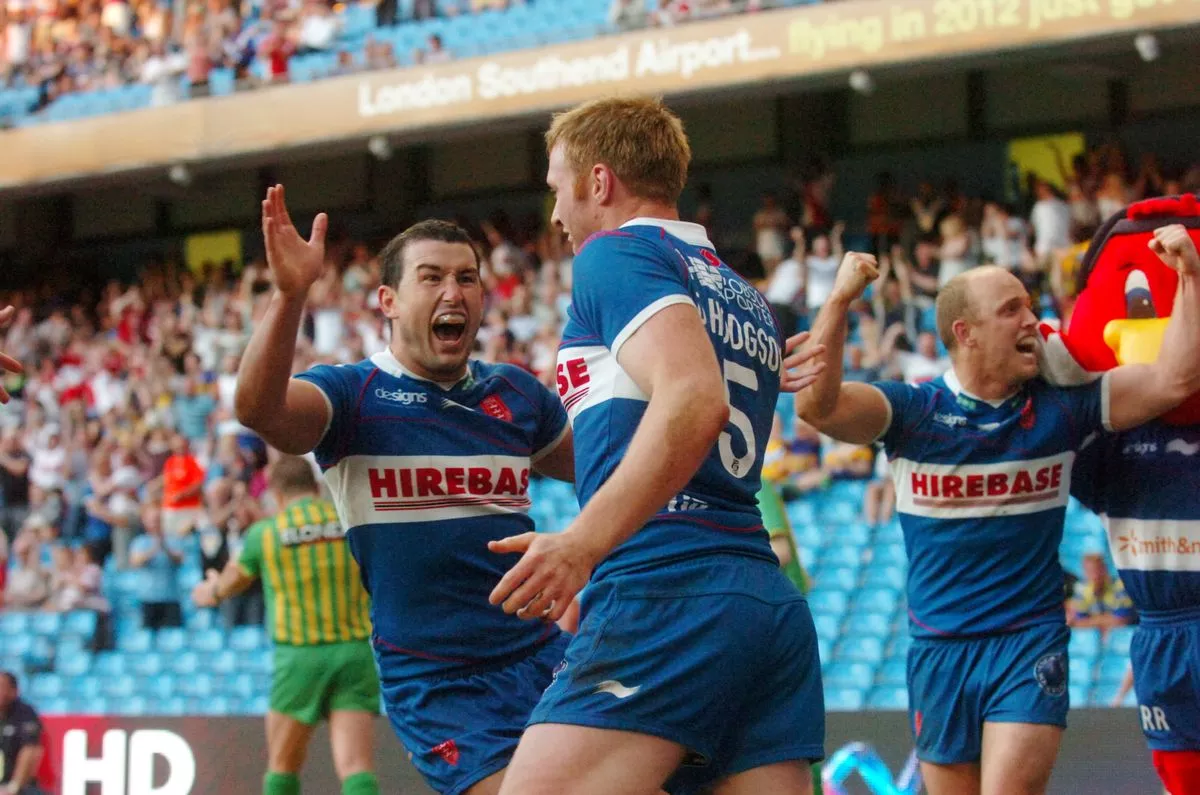 David Hodgson celebrates his winning derby try with Shannon McDonnell at the 2012 Magic Weekend