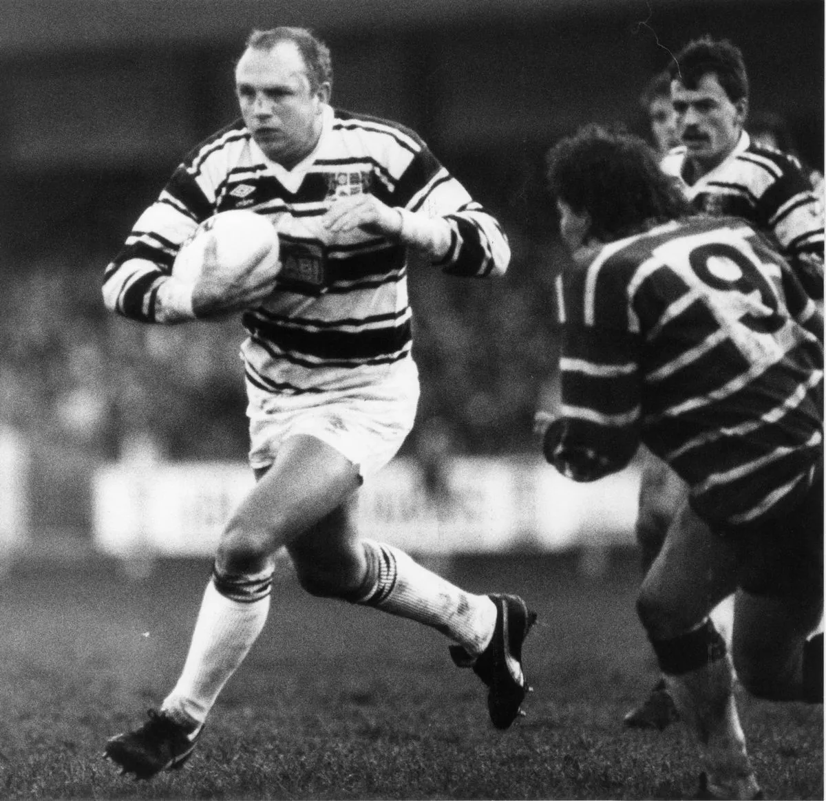Hull FC v Featherstone. Steve Norton looking for the way past T. Staniforth in 1986
