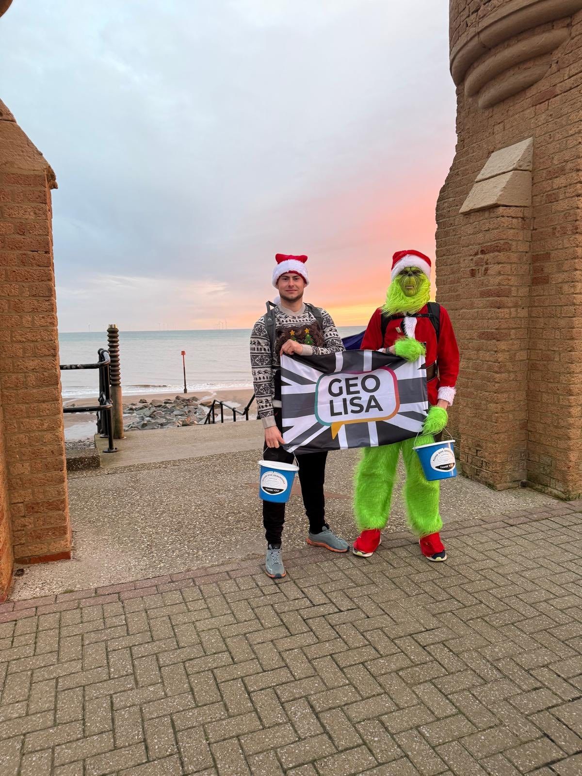 Dave Gelder dresses as the Grinch for a marathon fundraiser walk from Withernsea to Hull, supported by pals including Connor Harrison