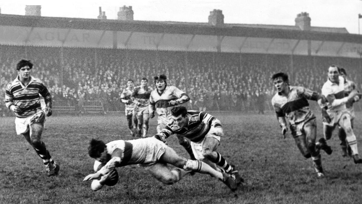 Stock's, Hull's right-winger, brings down Blackmore of Rovers during the Christmas Day derby at the Boulevard in 1965. Only 8,500 paying £1,262 watched the game, a disappointing crowd for this return to the traditional holiday date for the meeting of these old rivals.
