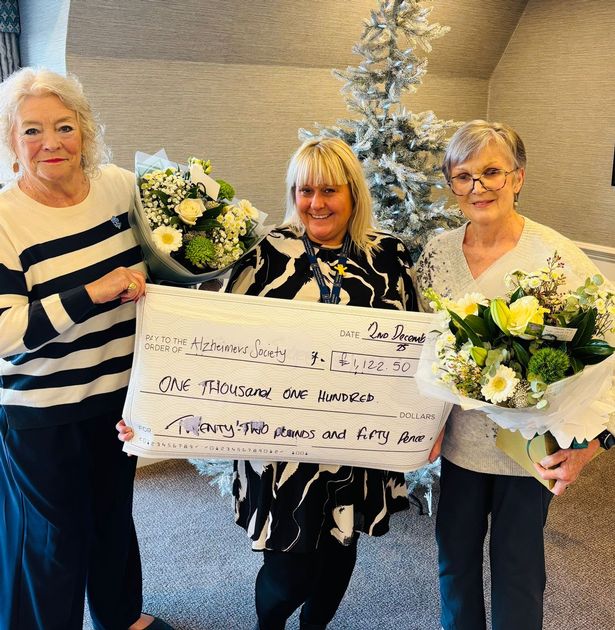 Trish, Joanne, and Jackie with the cheque for Alzheimer’s Society