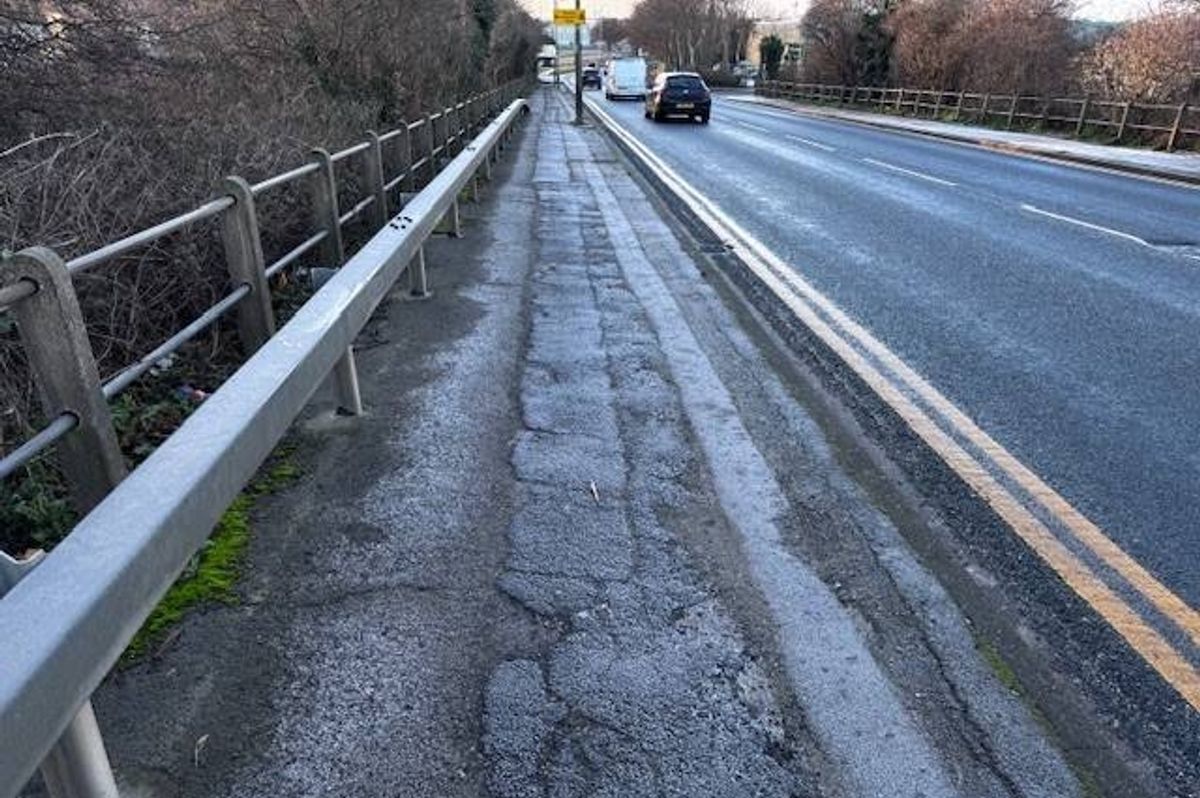 The existing footpath that is in need of repair on Marfleet Lane, in Hull