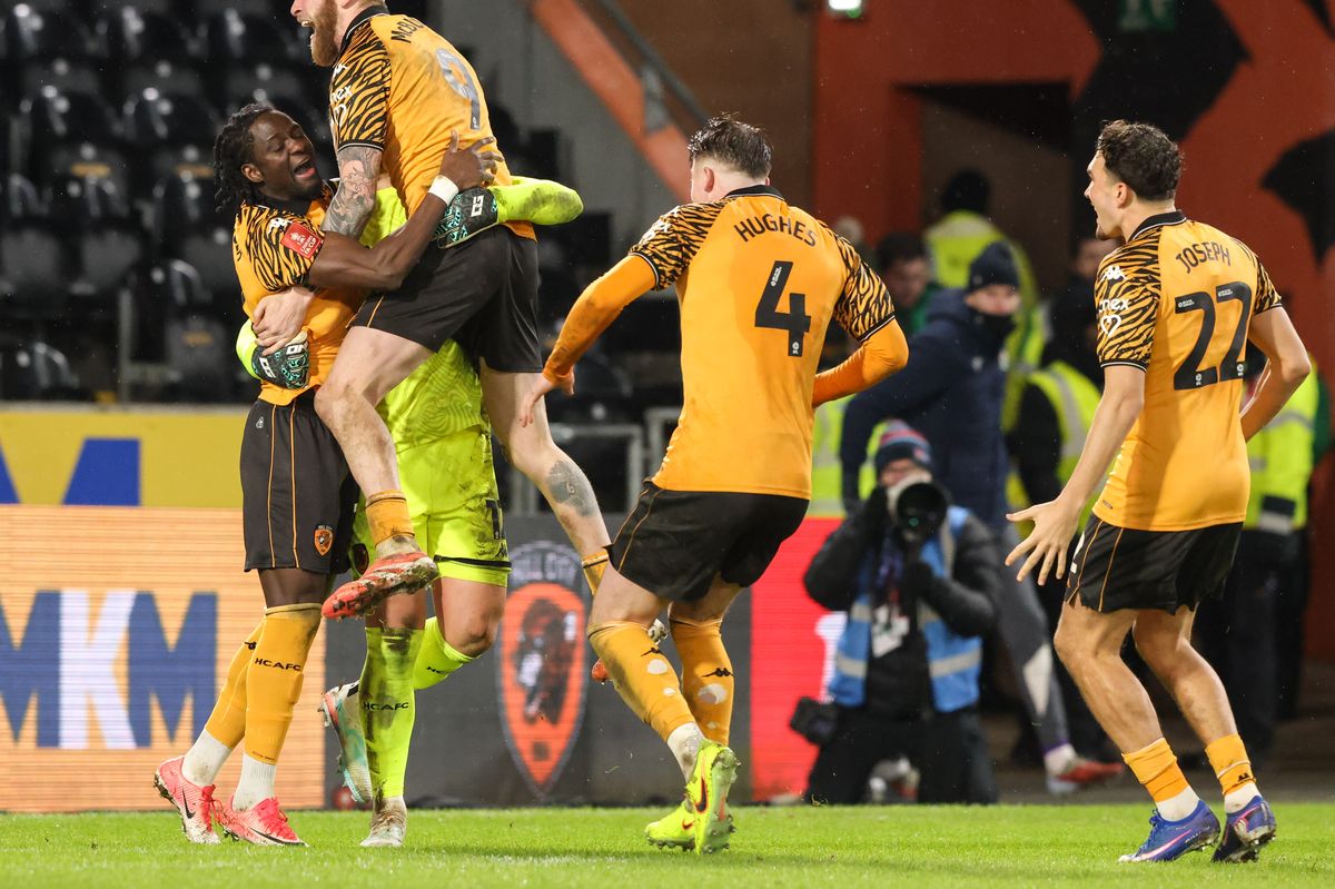Hull City's players celebrate winning the shoot-out 