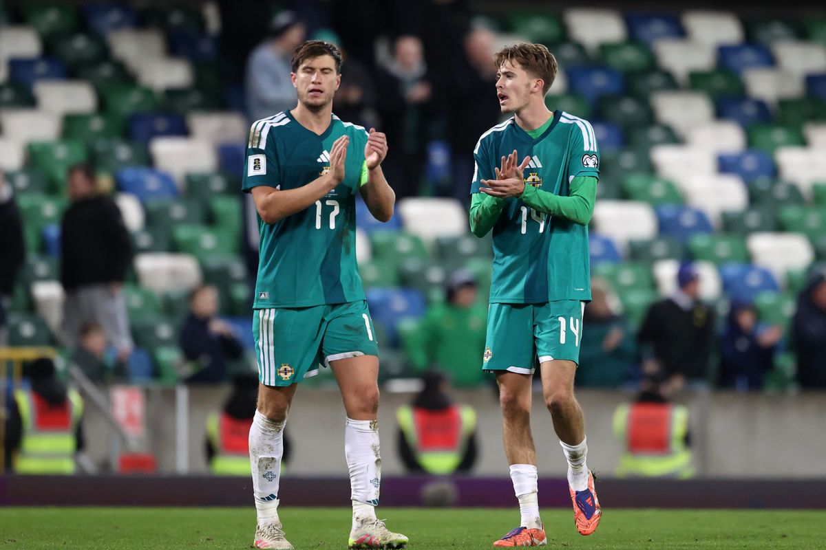 Northern Ireland's Paddy McNair and Isaac Price
