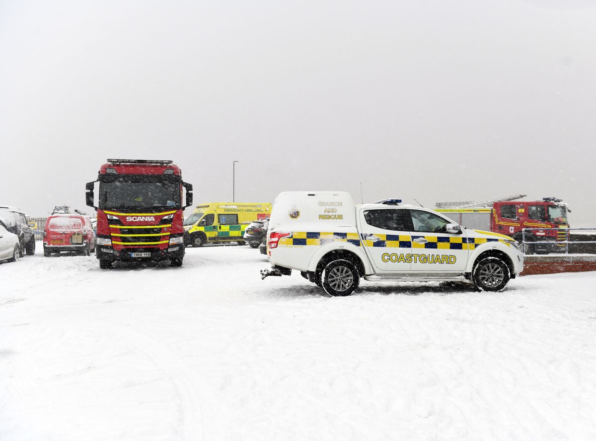 Emergency services vehicles on The Promenade, Withernsea, a day after reports of people entering the water