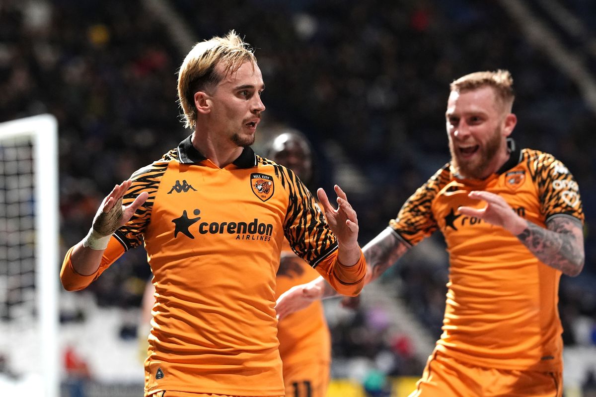 Liam Millar and Oli McBurnie celebrate the opening goal at Deepdale