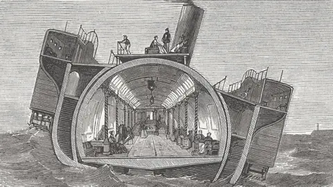 ZU_09 / Getty Images A engraved newspaper illustration showing a cross section of the SS Bessmer it shows passengers in the cylindrical central cabin which is tilting in the opposite direction to the ship