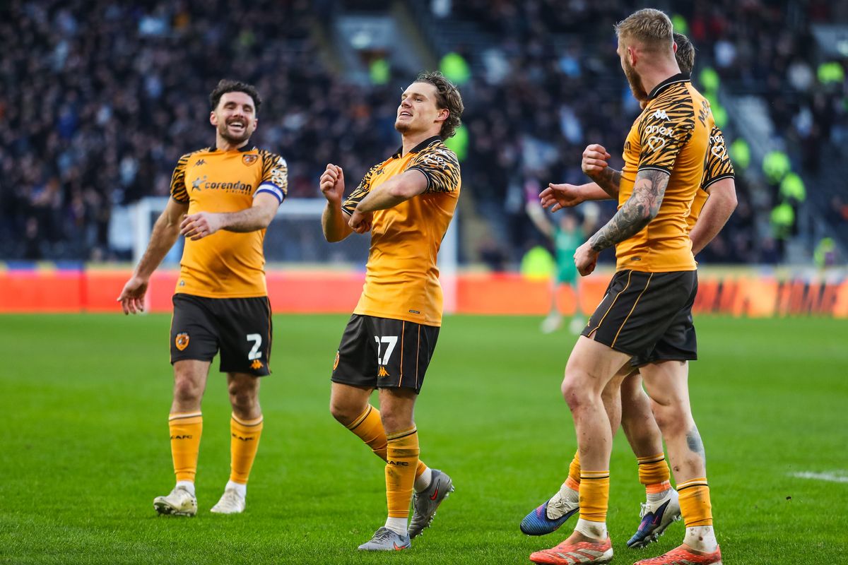 Hull City's Regan Slater celebrates scoring against Swansea City