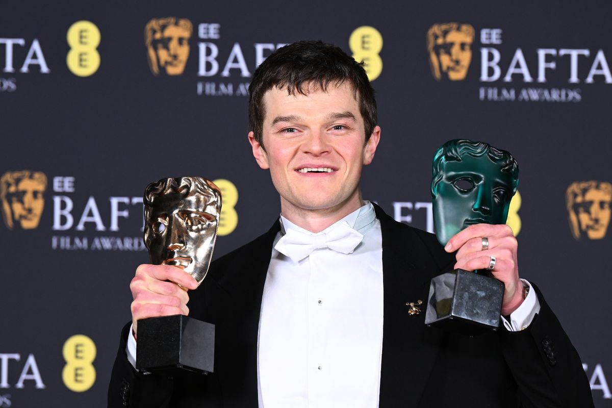Robert Aramayo with the Leading Actor Award for 'I Swear' and the EE Rising Star Award during the 2026 EE BAFTA Film Awards at The Royal Festival Hall