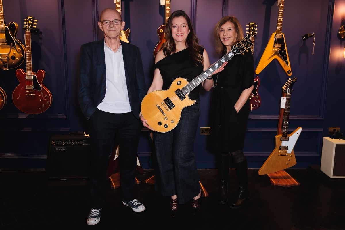 Woody Woodmansey, Lisa Ronson and Suzi Ronson at the launch of the limited-edition replica of the 1968 Les Paul Custom, the iconic guitar of the late Hull musician Mick Ronson