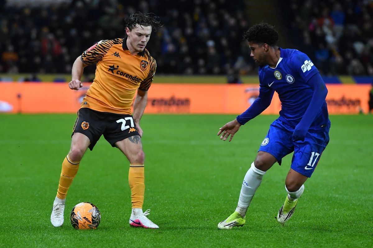 Regan Slater faces up Andrey Santos against Chelsea