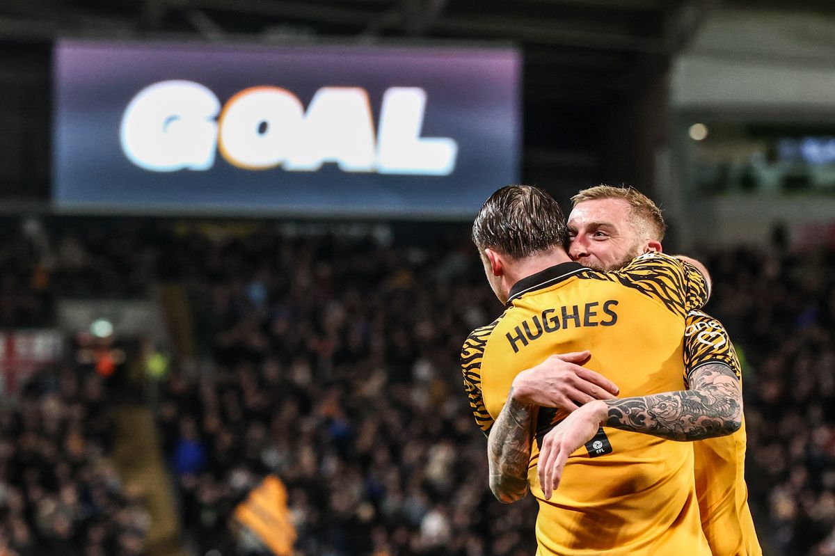 Oliver McBurnie of Hull City celebrates his goal against Derby