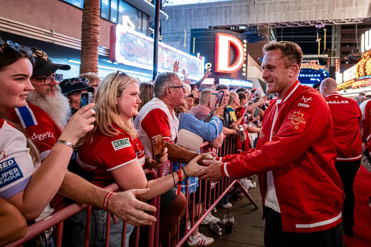 Jez Litten embraces the Hull KR supporters at the huge Fremont Street event, Las Vegas.