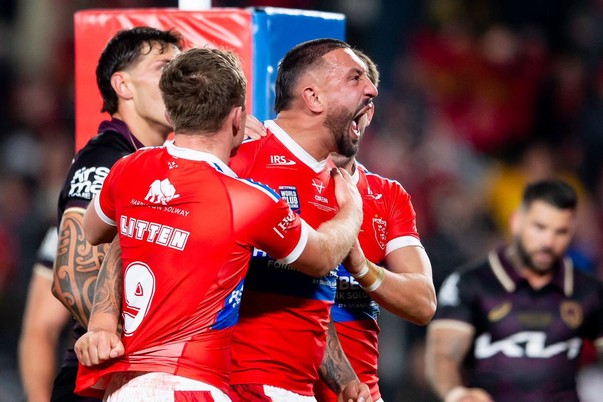 Hull KR captain Elliot MInchella celebrates scoring a try against Brisbane Broncos in the World Club Challenge.