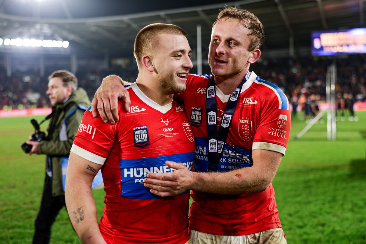Hull KR's Mikey Lewis and Jez Litten celebrate the historic World Club Challenge win.