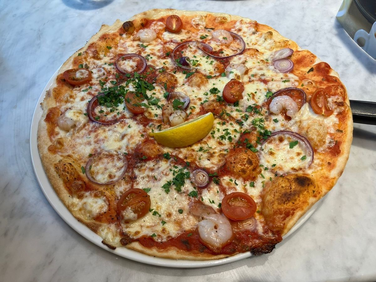 Garlic prawn pizza with the bigger, thinner, crispier 'romana' base