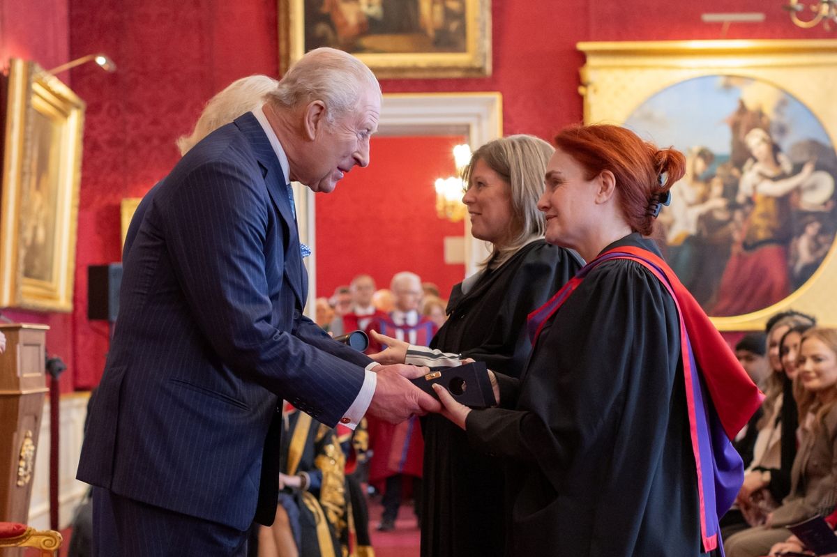 Debra Gray CBE (Principal & CEO of Hull College) and Deb Millar OBE (Executive Director of Digital Transformation at Hull College) receiving the award from The King and Queen