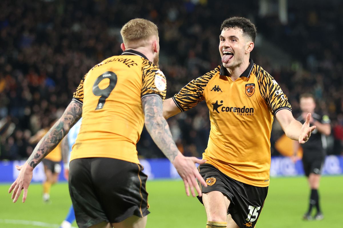 John Egan celebrates scoring against Derby County with Oli McBurnie 