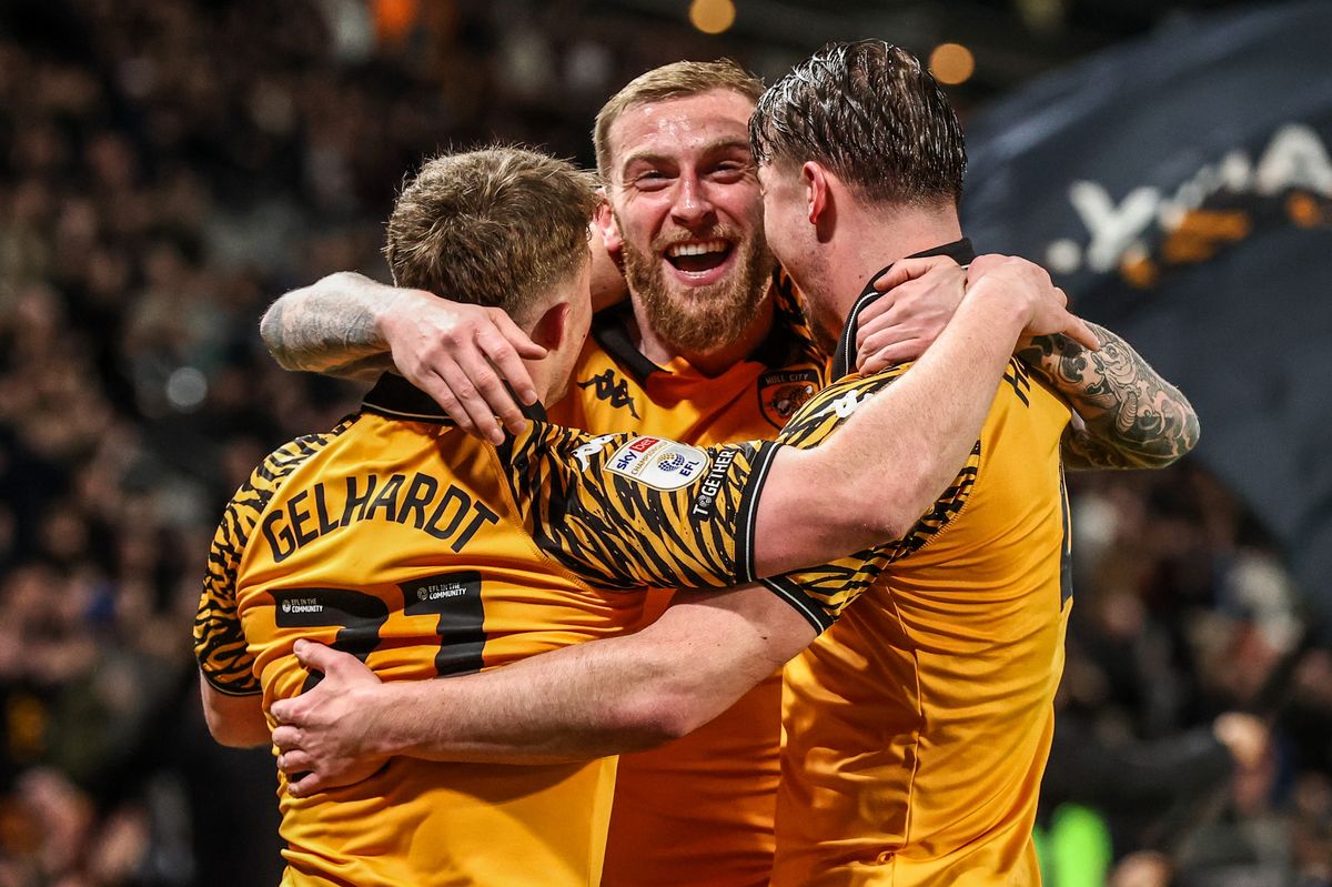 Oliver McBurnie of Hull City celebrates his goal against Derby