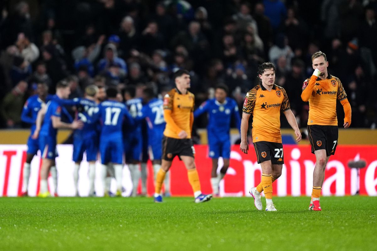 Hull City's Liam Millar (right) and Regan Slater appear dejected after Chelsea score their second goal 