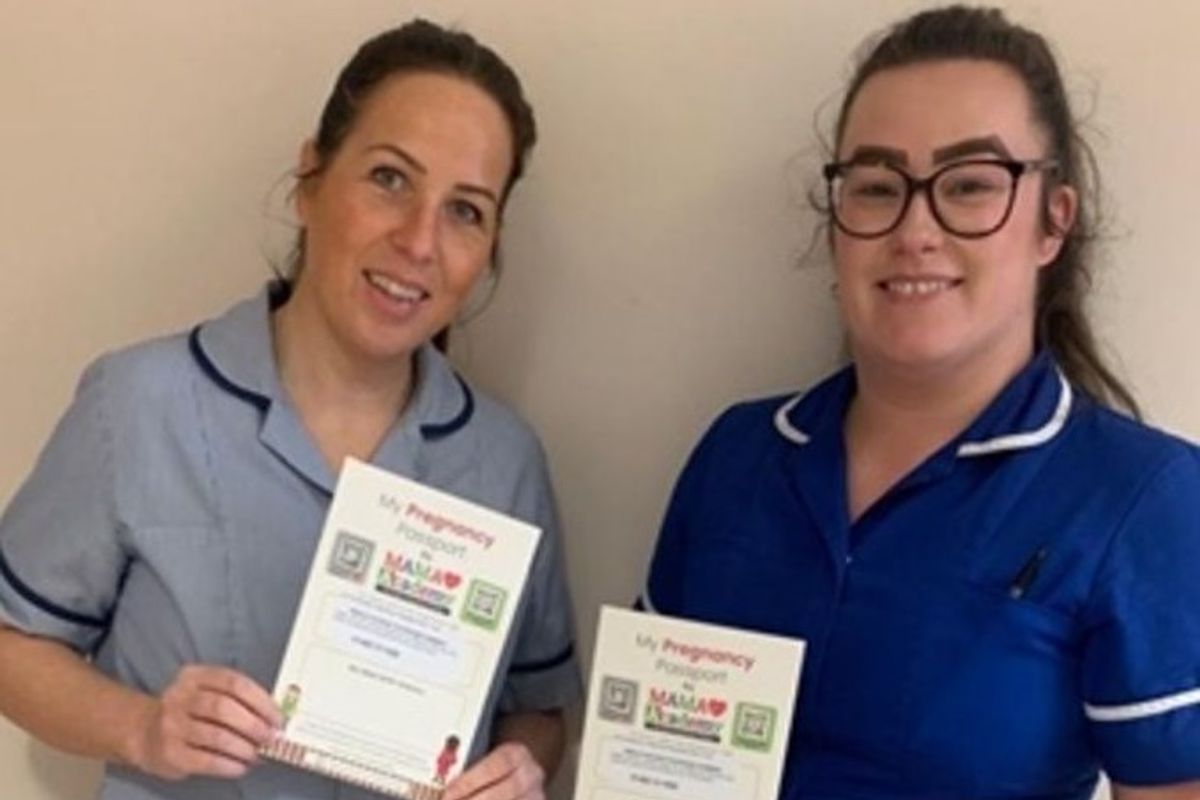 Maternity support worker Katie Saunby (left) and midwife Samantha Brotherton with the MAMA Academy Pregnancy Passports that will be handed out from this week