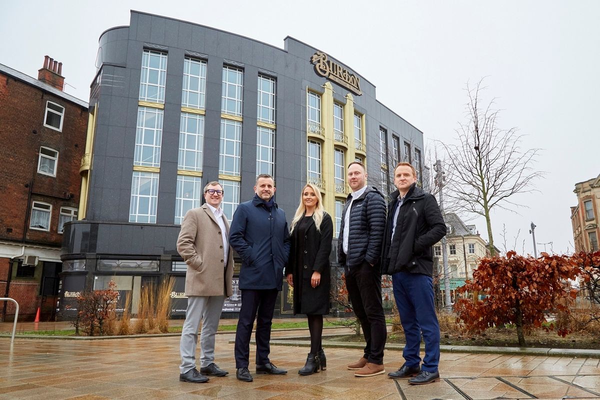 Dominic Gibbons with Liam Knaggs, Natalia Rudd, Matt Clarkson and Tom Watson outside Burton House.