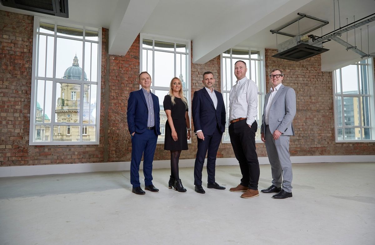 Wykeland MD Dominic Gibbons, centre, with, from left, promoted colleagues Tom Watson, Natalia Rudd, Matt Clarkson and Liam Knaggs, in the newly-refurbished office space at Burton House in Hull city centre.
