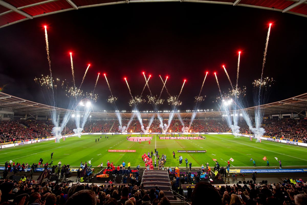 Hull KR and Brisbane Broncos walk out at the MKM Stadium.